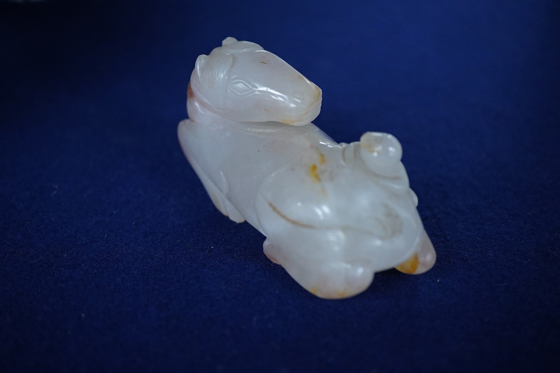 A Chinese agate carving of a horse and monkey, 8cm wide